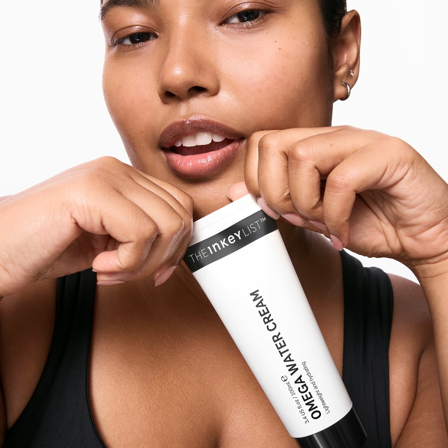 supersize-omega-water-cream-duo-u2 03_KAFFYA_07_HOLDING_OMEGA_SUPERSIZE_001.jpg